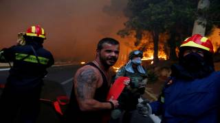 Arson Suspected as Greek Wildfires Devastate Resort Areas near Athens, Killing Scores
